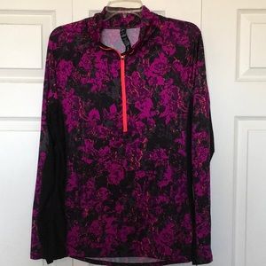 3/4 zip pullover. 92% polyester 8% spandex.